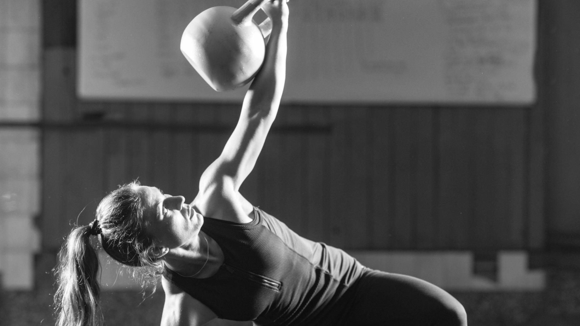 Rotational kettlebell windmill presses for power and strength which are good for fighters.